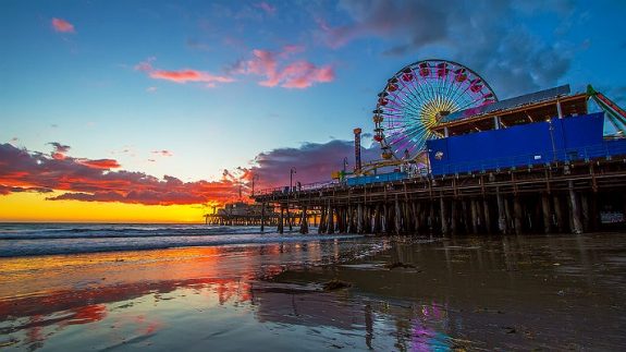 santa-monica-pier-sunset Santa Monica is full of activities to do all year long like the Santa Monica Pier, the beach, and the Ferris wheel. Stay in a beautiful hotel like casa del mar where you can relax in the spa while overlooking the beach.